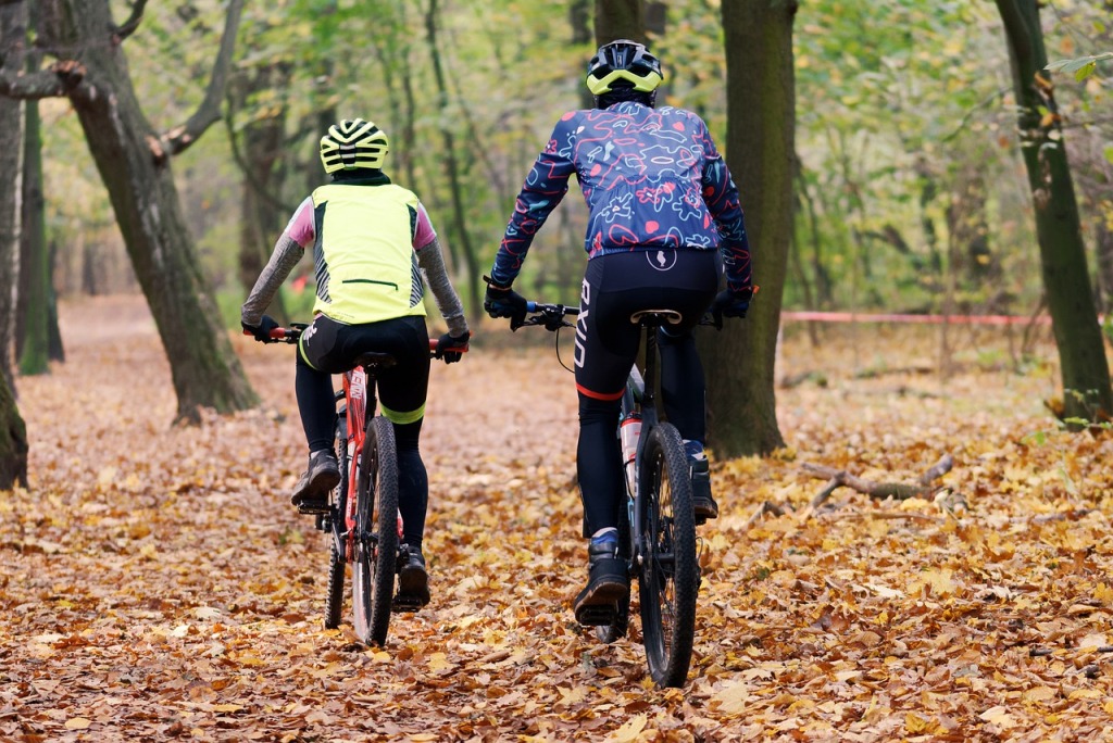 Bicyclists in forest. Richard St. Barbe Baker Afforestation Areas has a Winter Trail Network